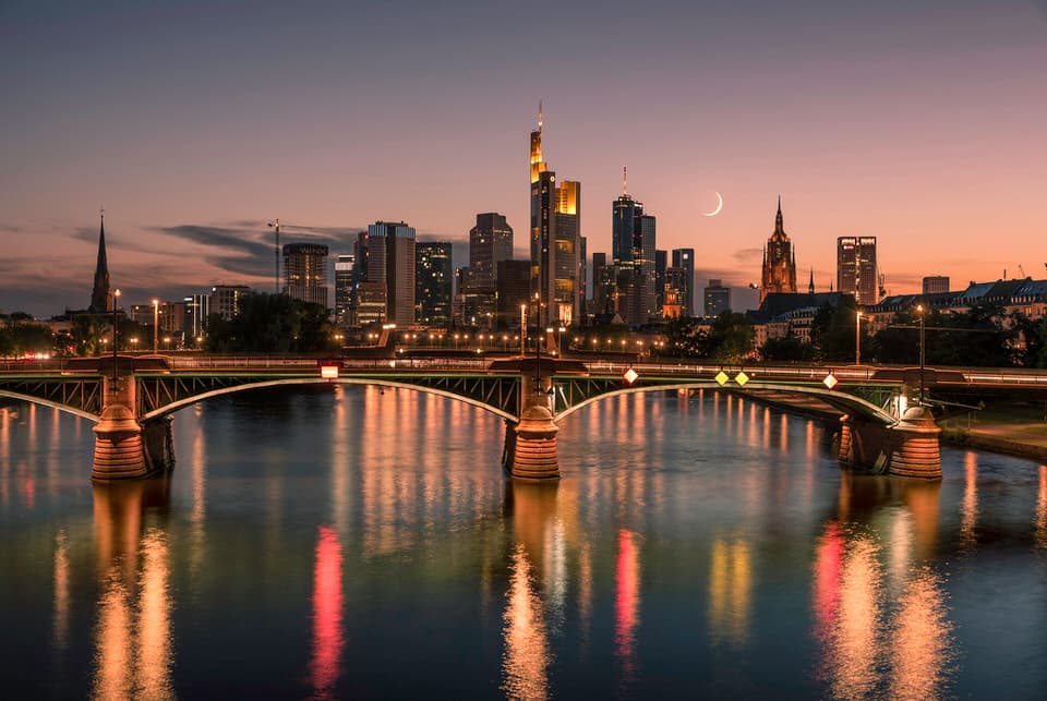 Frankfurt skyline and Main River during twilight