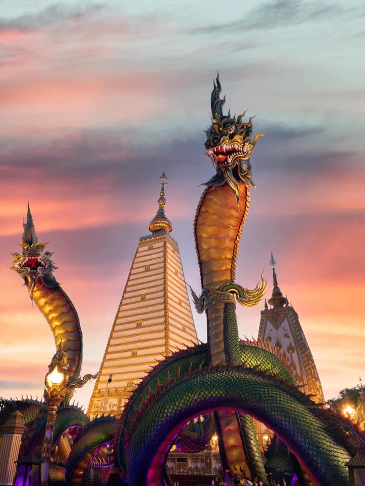 Sunset view of Wat Phra That Nong Bua with Naga statues