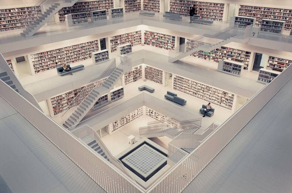 Interior of Stuttgart Library with white design and geometric staircases