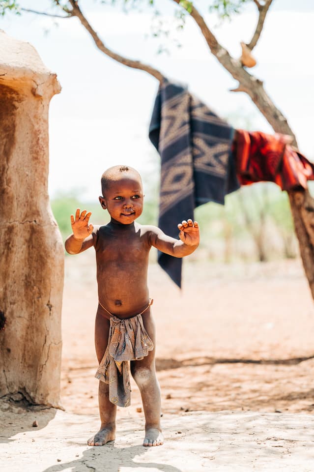 Joyful Himba child in Namibia