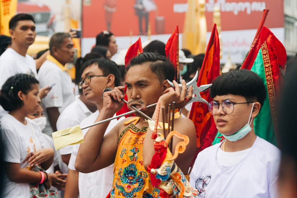 Participants in the Phuket Vegetarian Festival parade in Old Town Phuket.