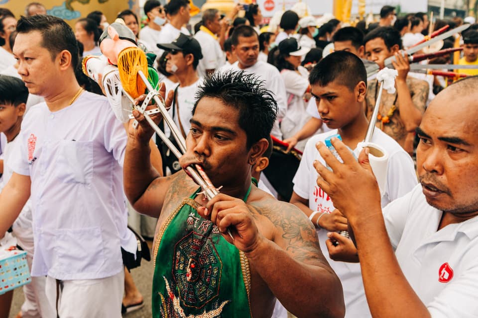 Devotee performing piercing ritual during Phuket Vegetarian Festival.