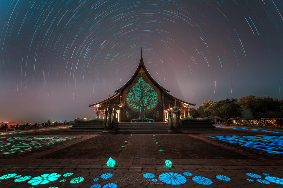 Ubon Ratchathani, Thailand - Star Trails over Wat Sirindhorn Wararam. photo