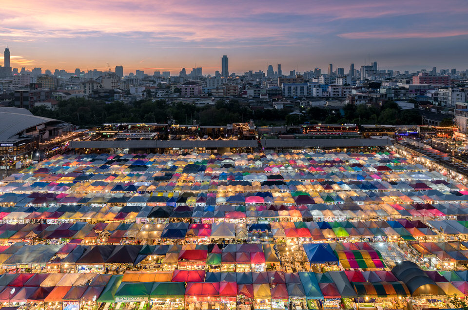Ratchada Night Train Market, Bangkok, Thailand - Sunset over the Colorful Tents and Food Stalls of the Market photo